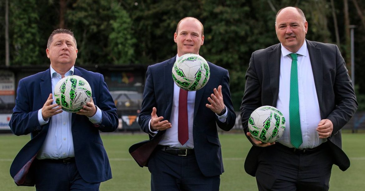 0_Communities-Minister-Gordon-Lyons-centre-with-Irish-Football-Association-IFA-president-Conrad-Kirk.jpeg
