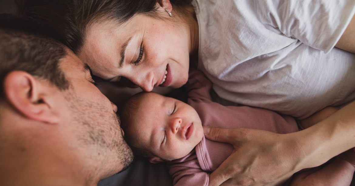 1_Close-up-of-parents-with-a-newborn-baby.jpg